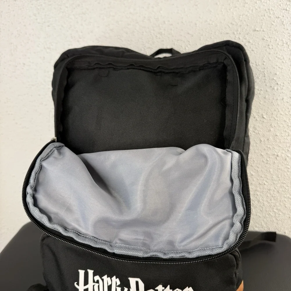 HARRY POTTER black Back Pack With Brown Leather Accents And House Crest Logo